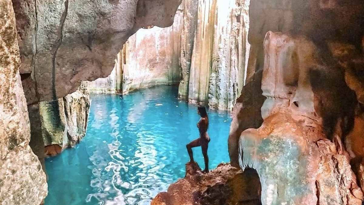 Sunlight and blue water inside the Sawa-i-Lau limestone caves