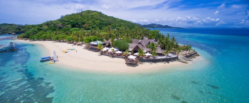 Aerial view of beaches, palms and the resort at Castaway Island Fiji
