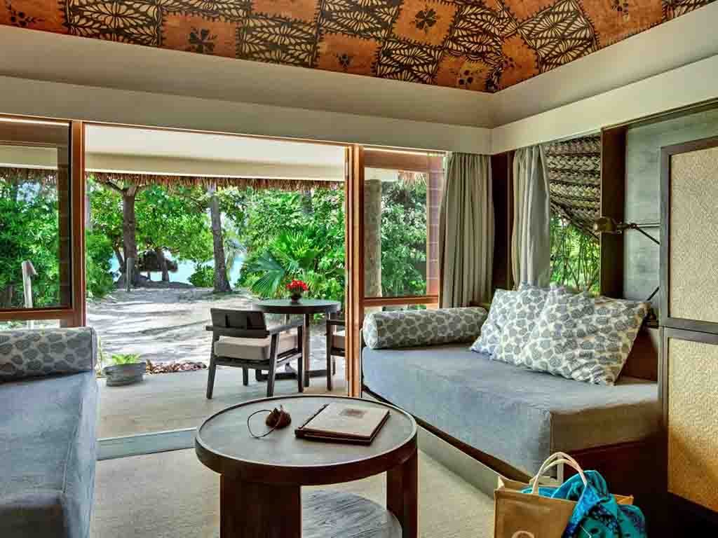 Ocean View Bure sitting area and open patio at Castaway Island Fiji