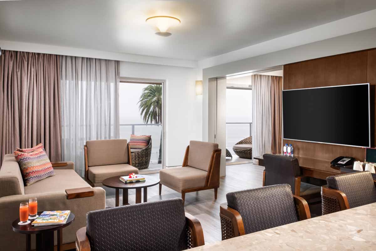 Spacious living and dining area at Crowne Plaza Fiji