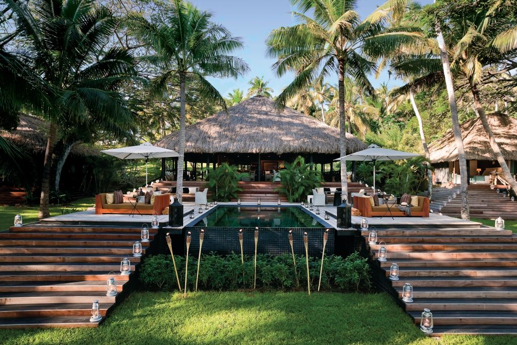 The main guest lodge and infinity pool at Dolphin Island