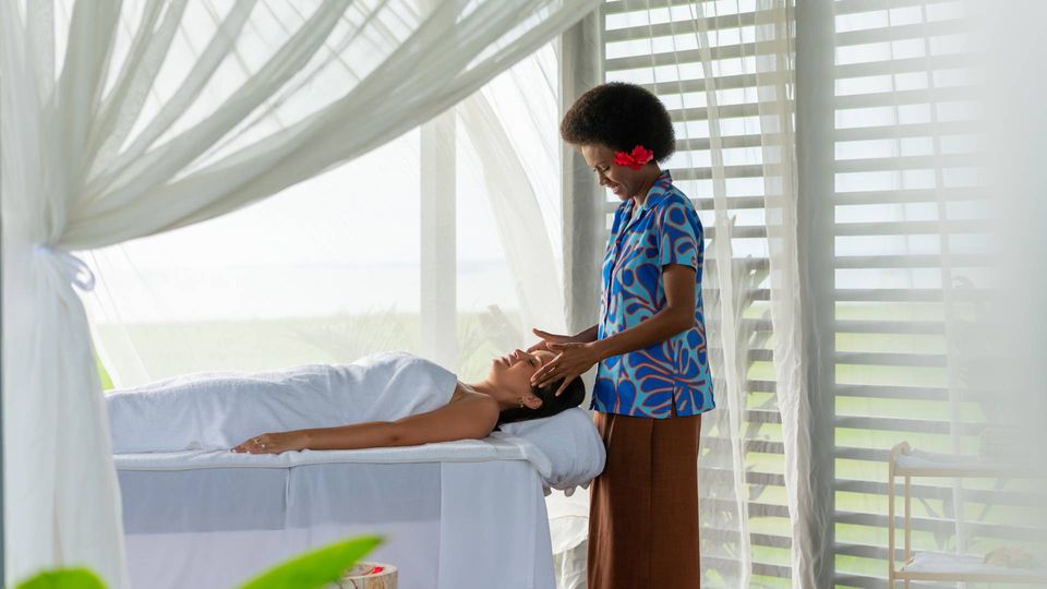Relaxing outdoor massage in the spa pavilion at Hilton Fiji Beach Resort & Spa