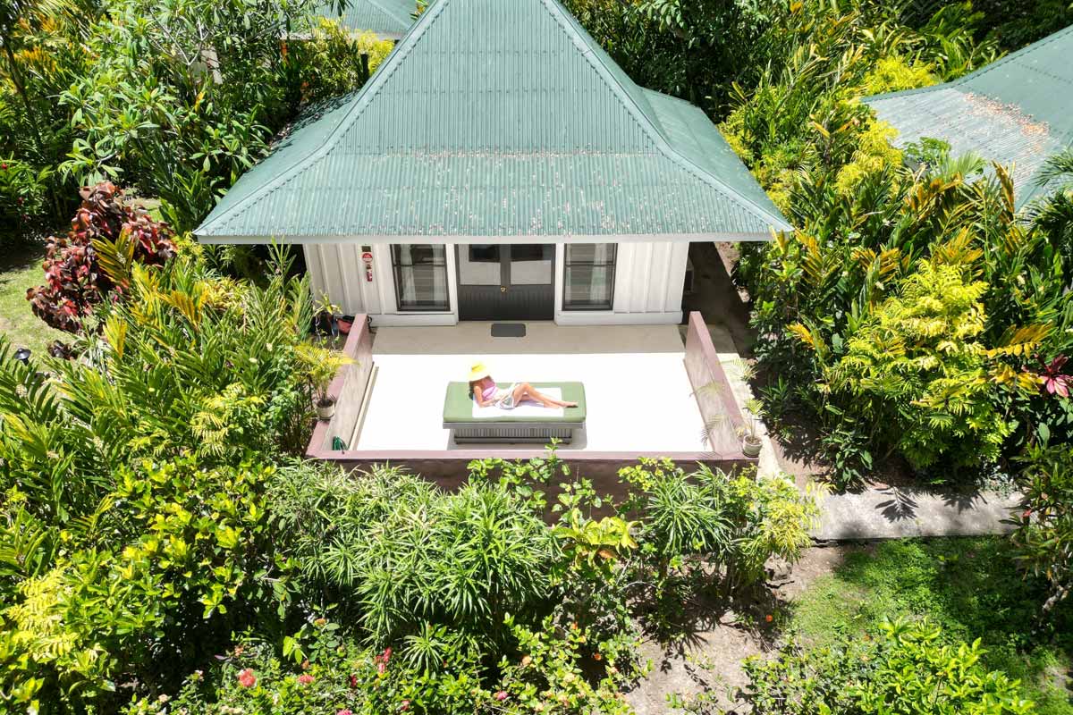 Garden-set accommodation with a shaded deck at Koro Sun Resort