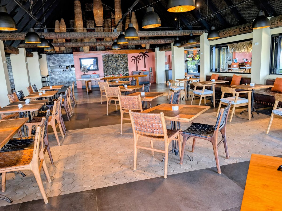 Tables and Fijian timber detailing in Matamanoa’s Vale Ni Blau restaurant