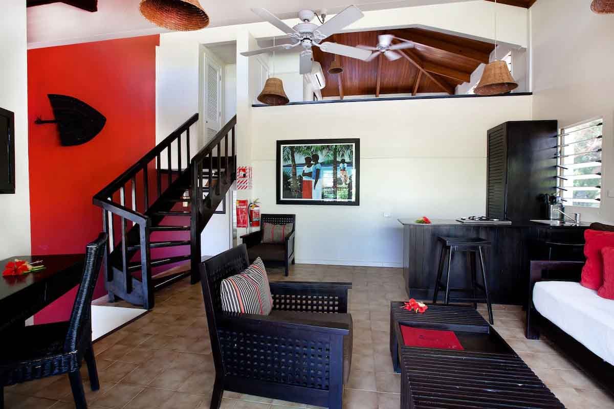 Split-level living space and staircase in a two-bedroom Garden Villa at Musket Cove