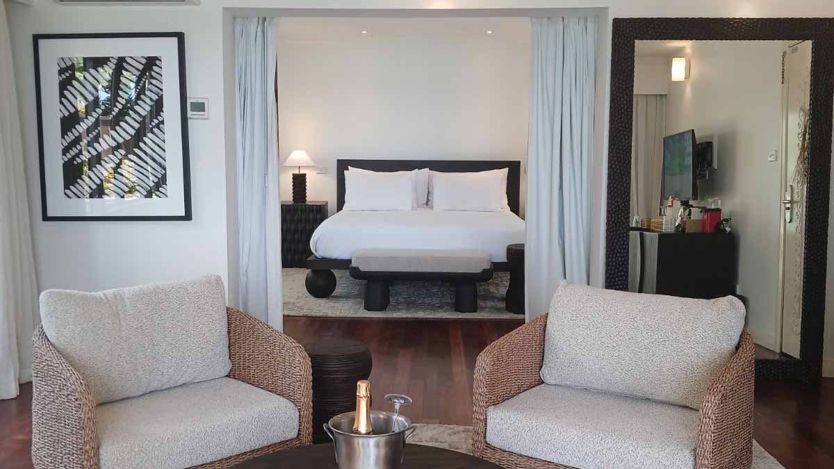 Bedroom and adjoining sitting area at Nanuku Resort Fiji