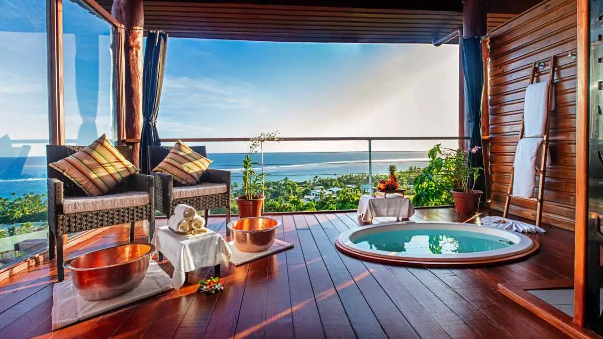Ocean-facing spa bath and balcony at Bebe Spa, Outrigger Fiji Beach Resort