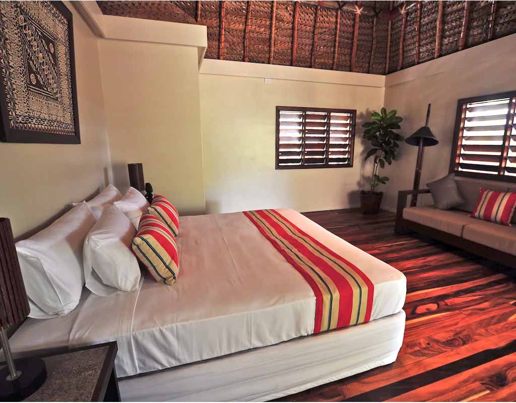 Bedroom in a Two Bedroom Beachfront Villa at Paradise Cove Resort