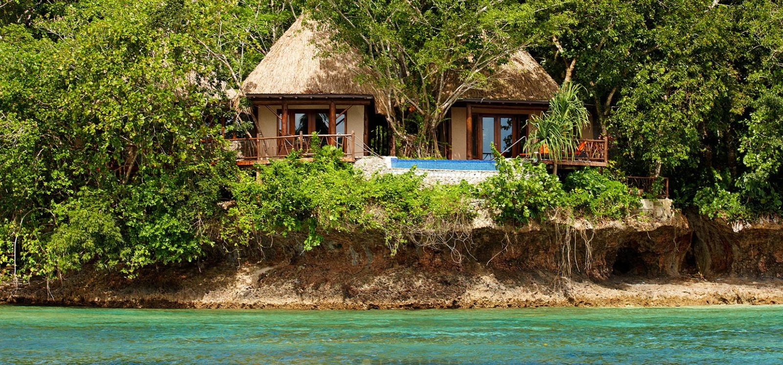 Waterfall Villa above a secluded cove at Savasi Island Resort