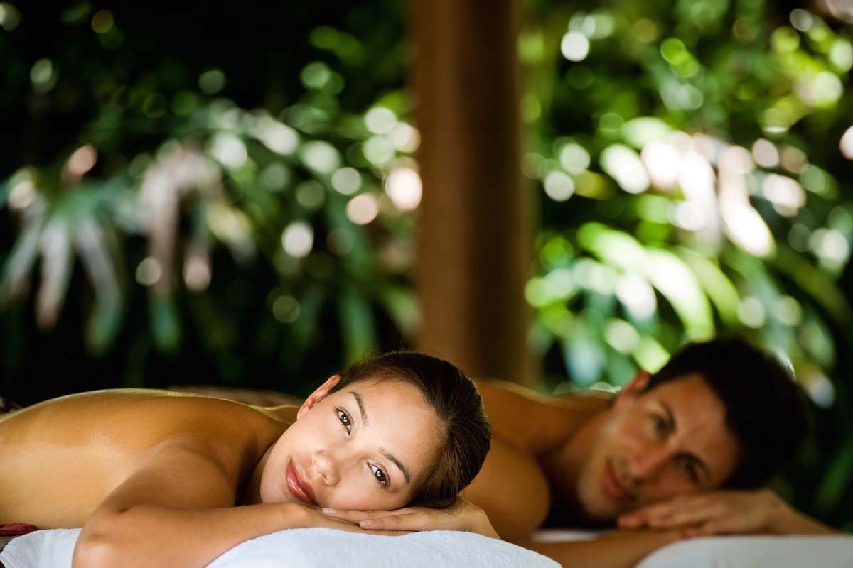 Couple enjoying a spa treatment at Savasi Island Resort