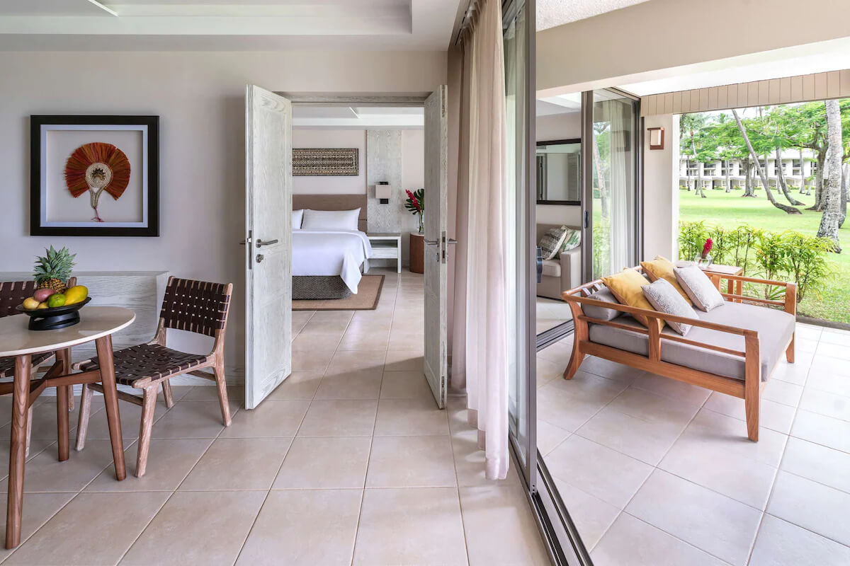 Living area and terrace of a Yanuca Lagoon Suite at Shangri-La Yanuca Island, Fiji