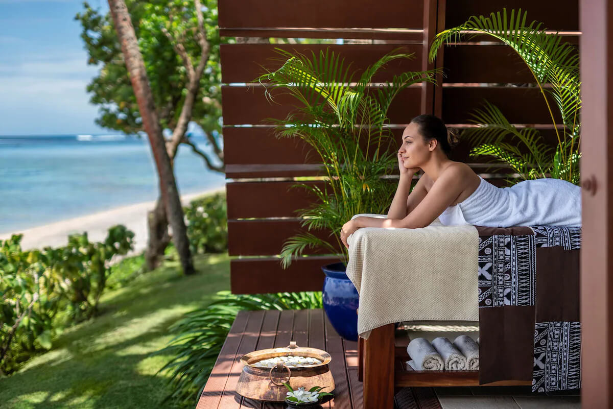 Relaxing on an open-air treatment terrace at Chi, The Spa at Shangri-La Yanuca Island, Fiji