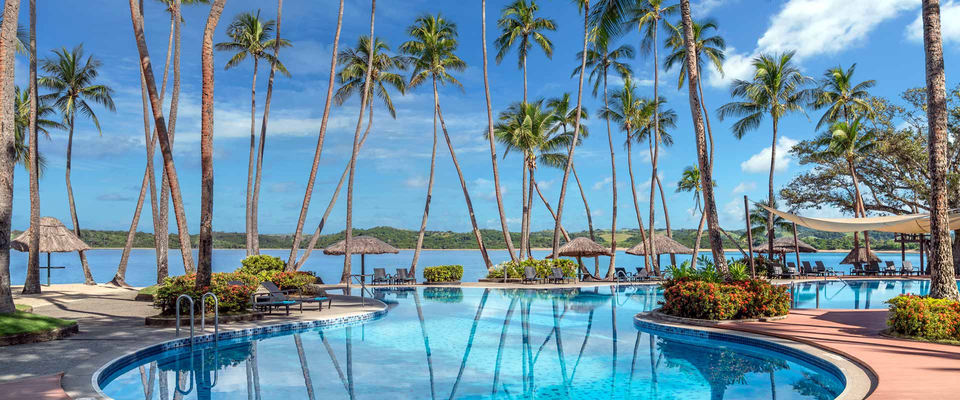 Palm-fringed lagoon pool at Shangri-La Yanuca Island, Fiji