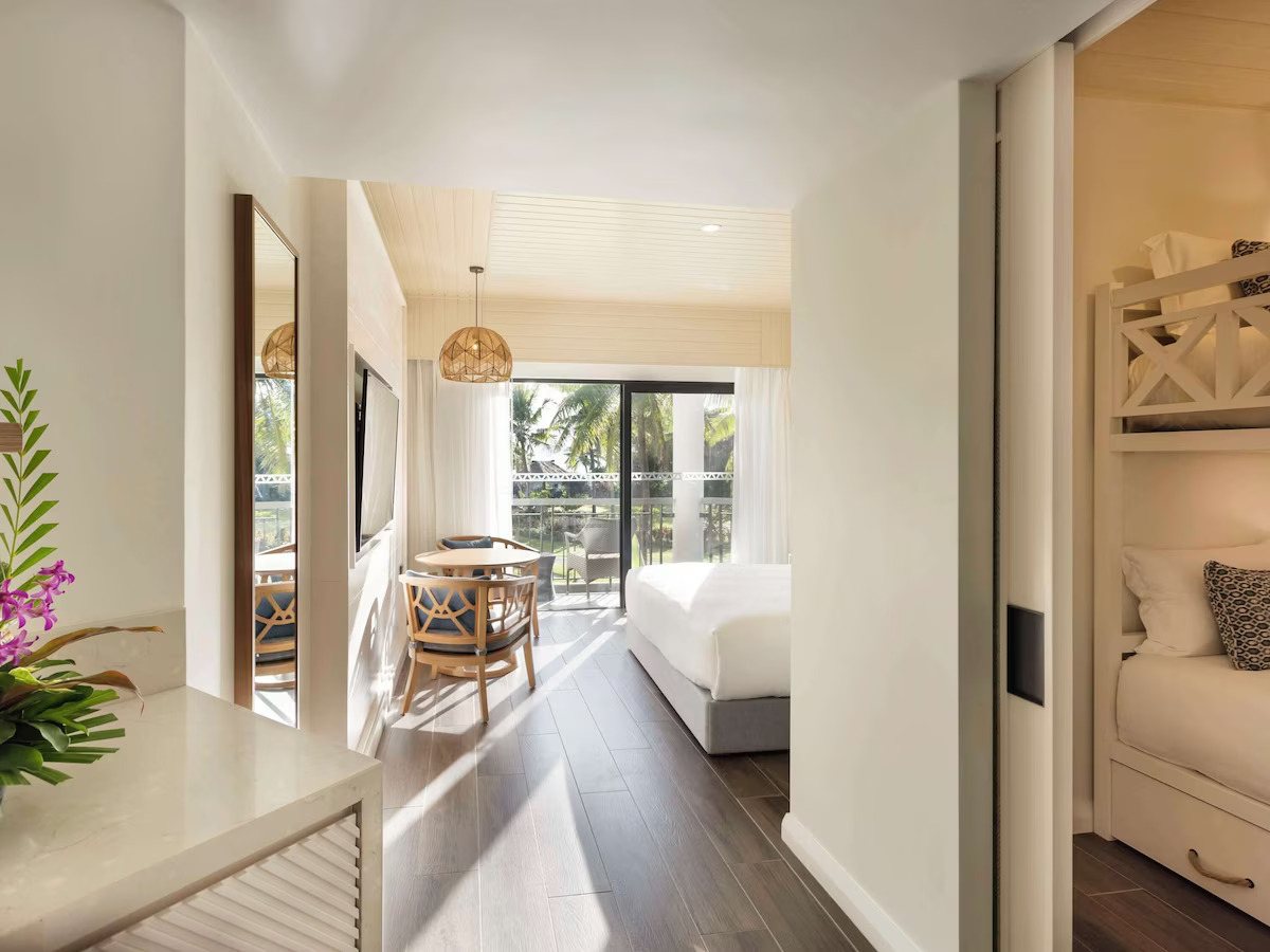 Family accommodation with a separate bunk-bed area at Sofitel Fiji Resort & Spa