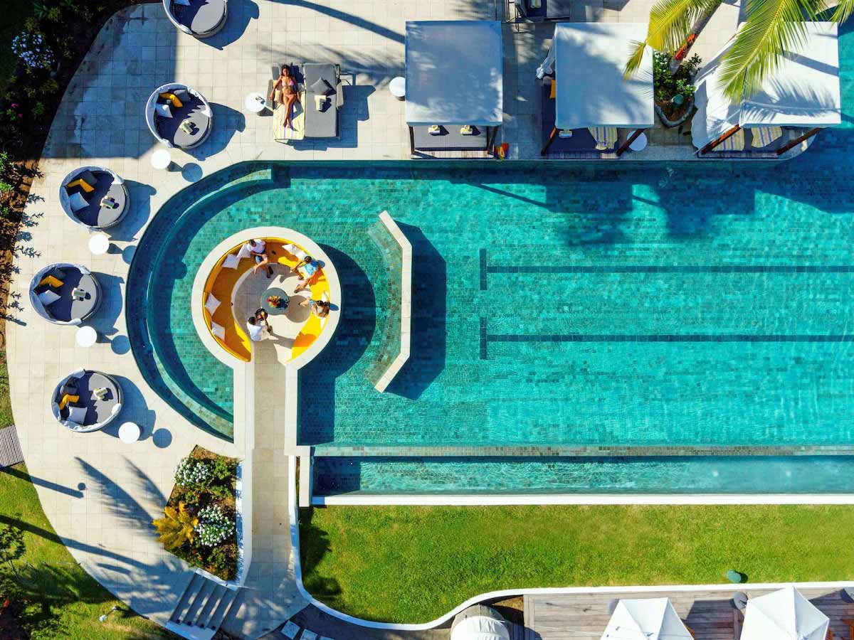 Overhead view of the Waitui Beach Club pool at Sofitel Fiji Resort & Spa