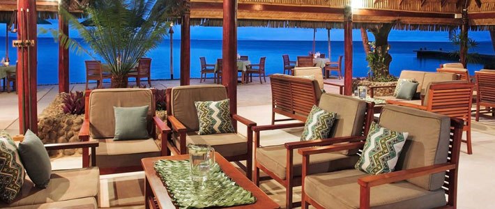 Open-air restaurant and lounge overlooking the water at Toberua