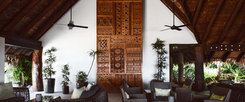 Open-air lounge and carved timber feature at Tokoriki Island Resort