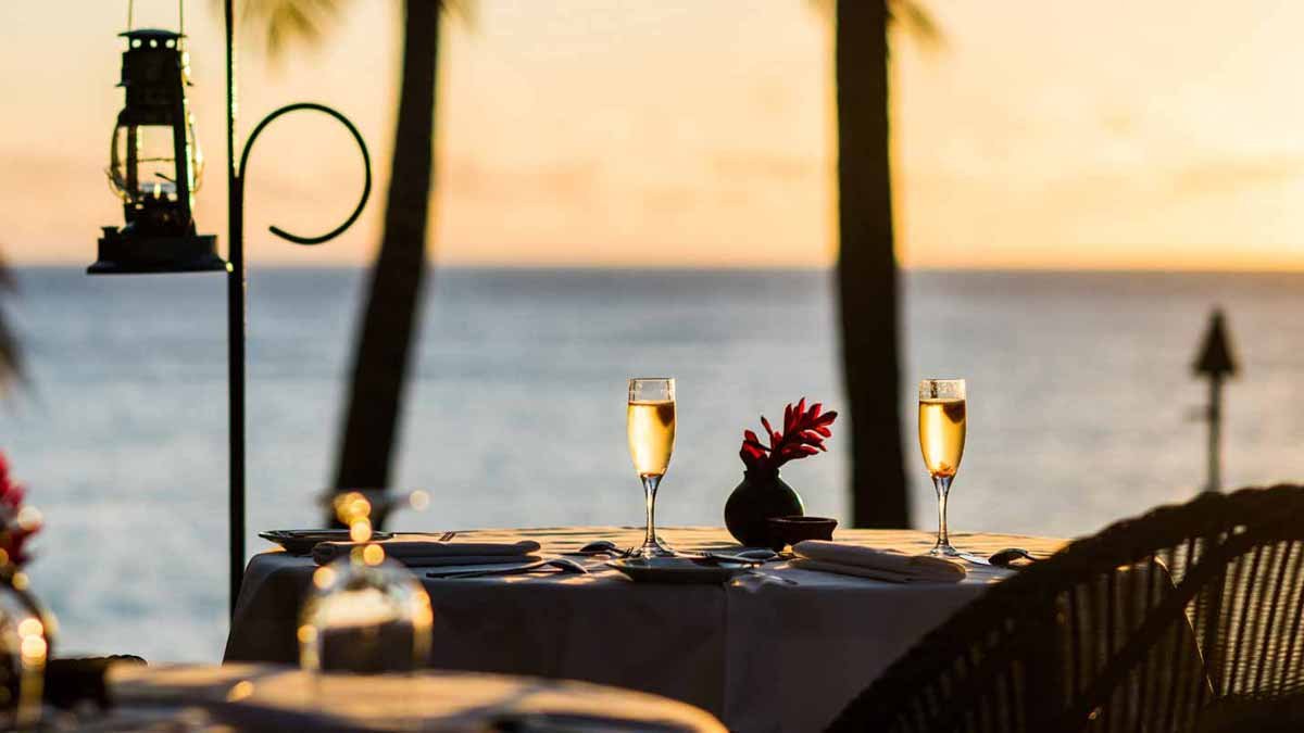 Oceanfront dining table set for two at Tokoriki Island Resort