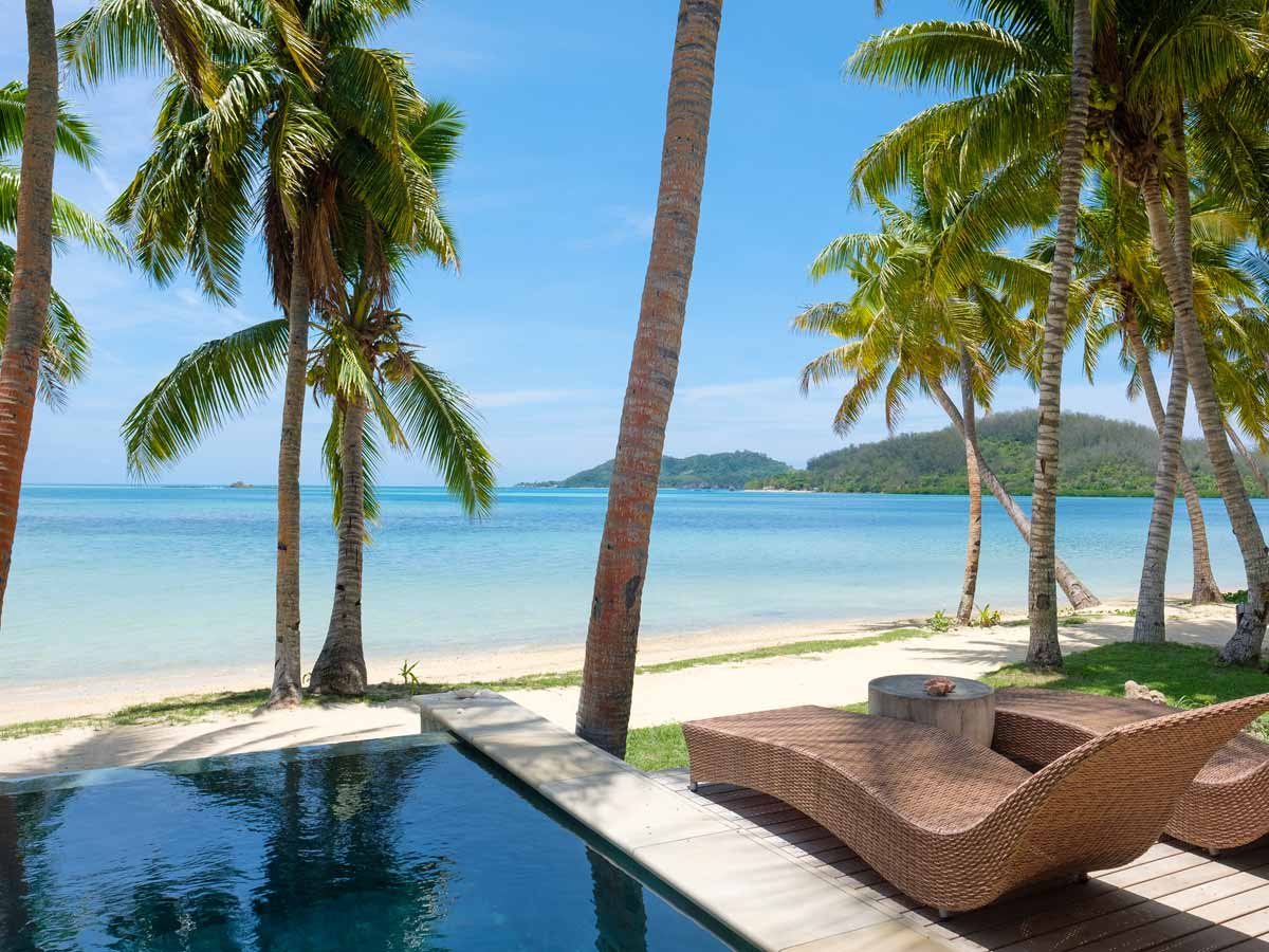 Private pool and beach outlook at a Tropica Island Resort Beachfront Pool Bure
