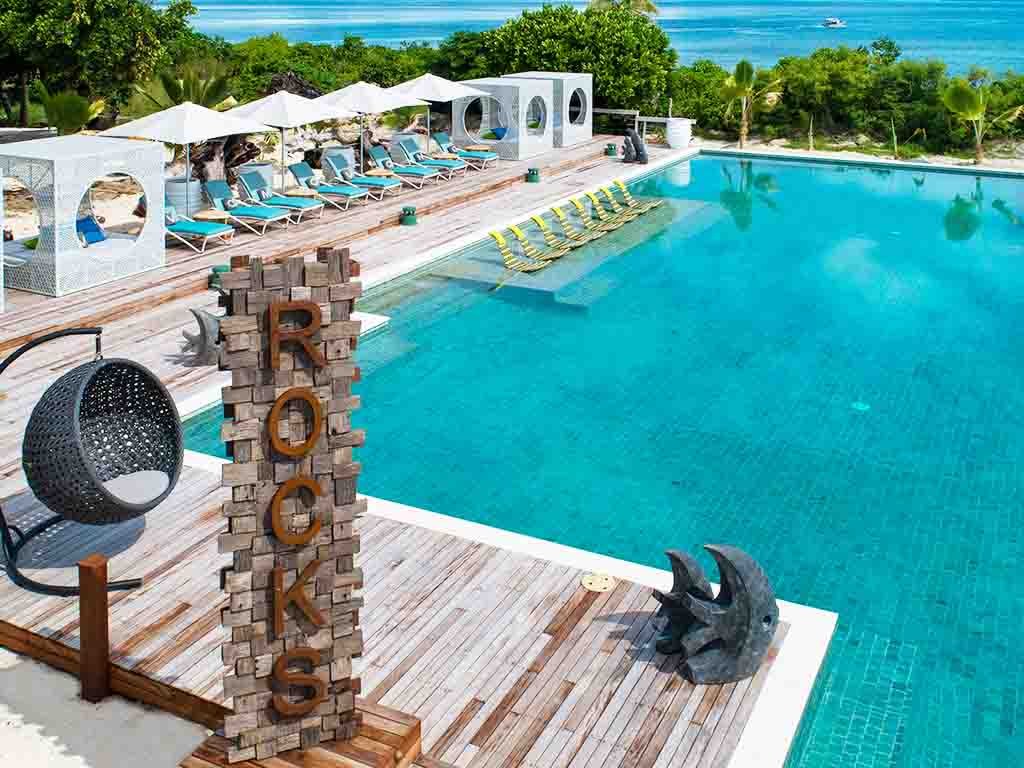 The Rocks pool, deck and cocoon cabanas at VOMO Island Resort