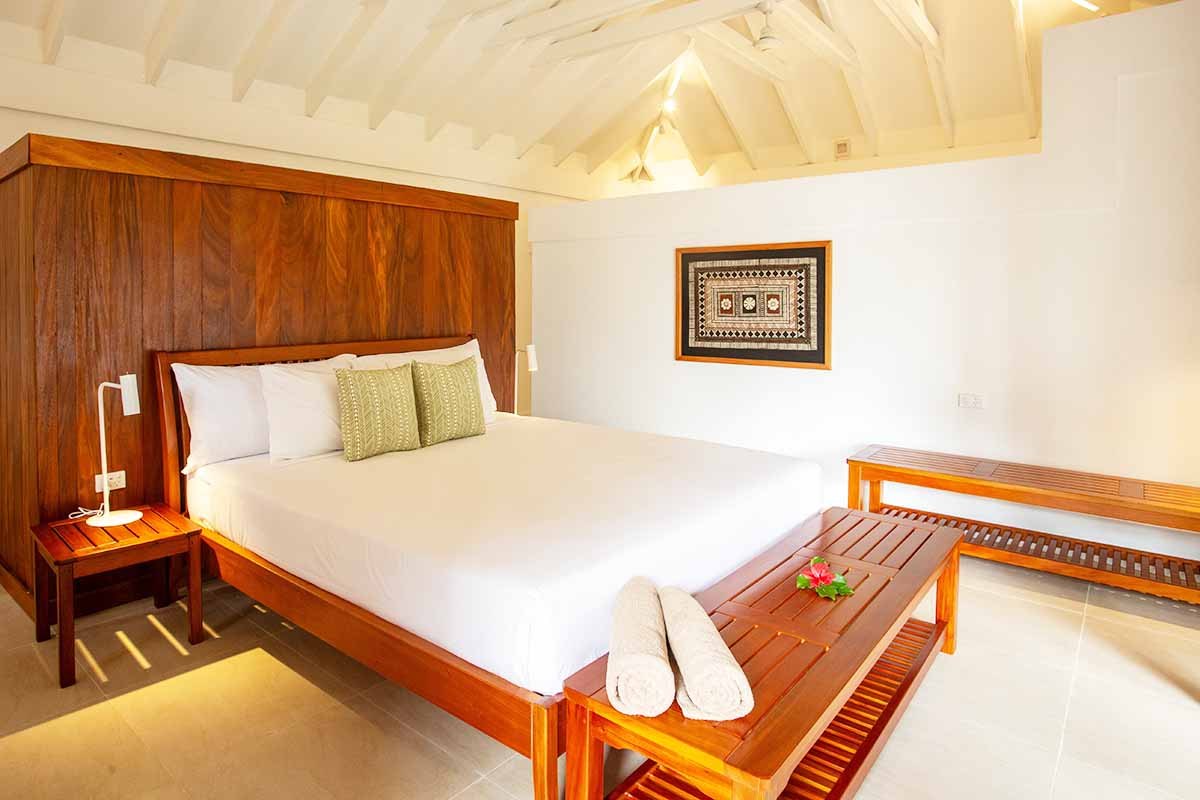 Deluxe Garden Bure bedroom at Waya Island Resort