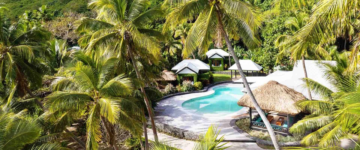 Resort pool among tropical gardens at Waya Island Resort