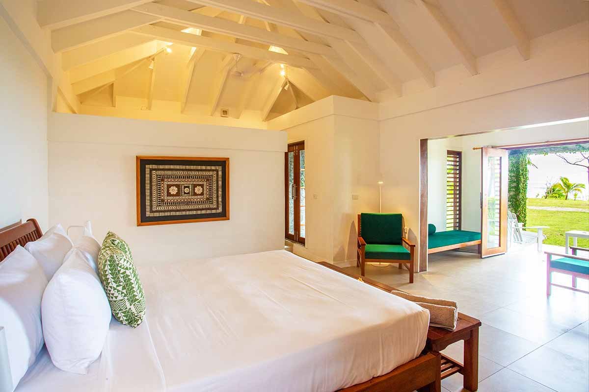 Deluxe Villa bedroom with garden terrace at Waya Island Resort