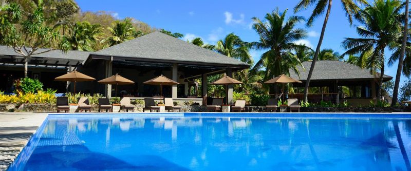 Main swimming pool and open-air resort buildings at Yasawa Island Resort