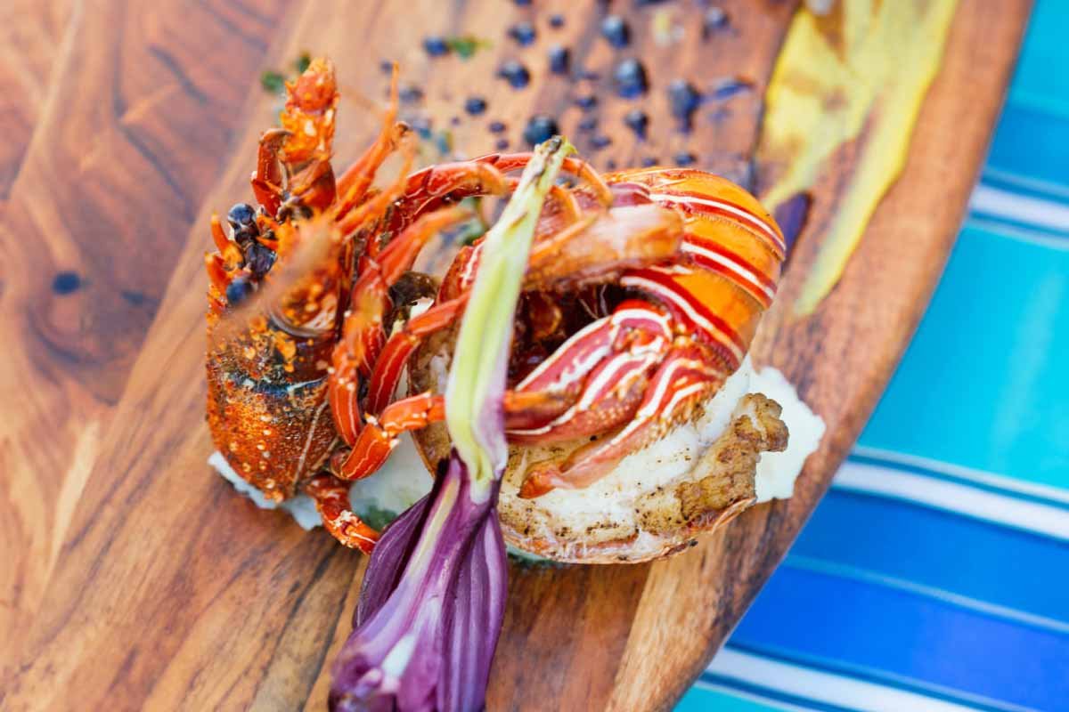 Seafood served with colourful vegetables at Yasawa Island Resort